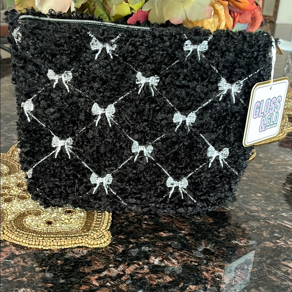 Gloss & Glow Black Textured Fabric Bag/Pouch With Metallic Gray Bow Pattern